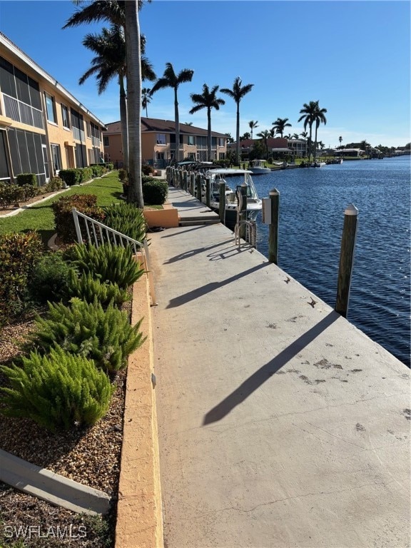 dock area featuring a water view