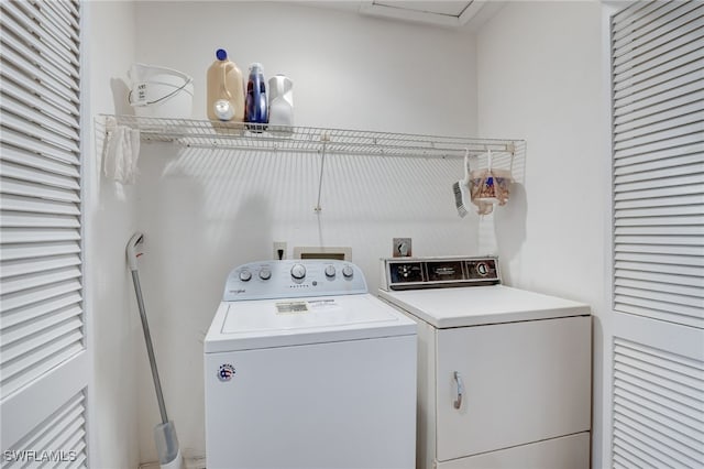 laundry area featuring separate washer and dryer