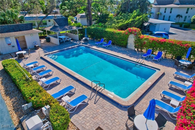 view of swimming pool featuring a patio