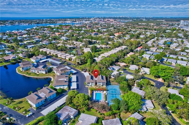 drone / aerial view with a water view