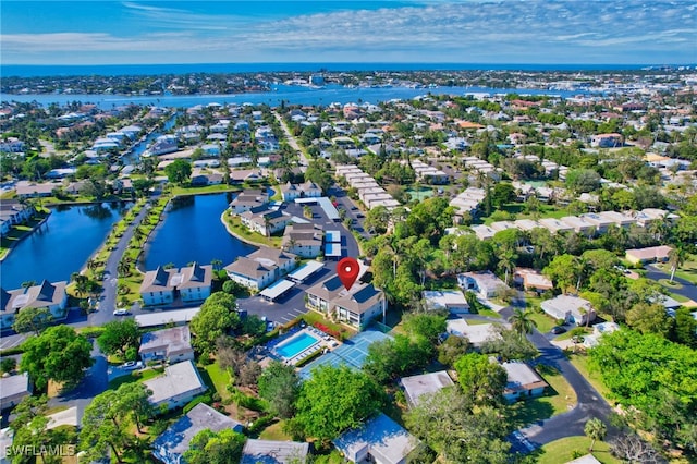 bird's eye view with a water view