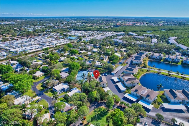 drone / aerial view with a water view