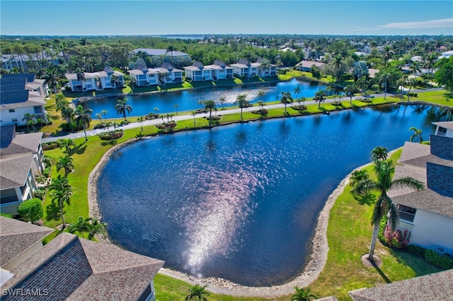 bird's eye view with a water view