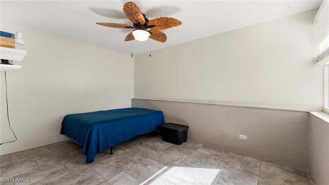 bedroom featuring ceiling fan