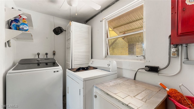 clothes washing area with ceiling fan and separate washer and dryer