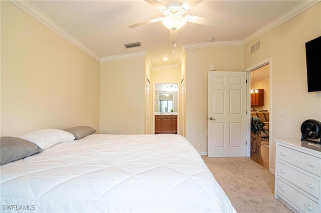 bedroom featuring connected bathroom, light carpet, crown molding, and ceiling fan