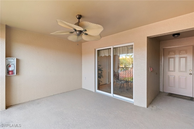 view of patio with ceiling fan