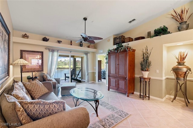 living room with light tile patterned flooring and ceiling fan