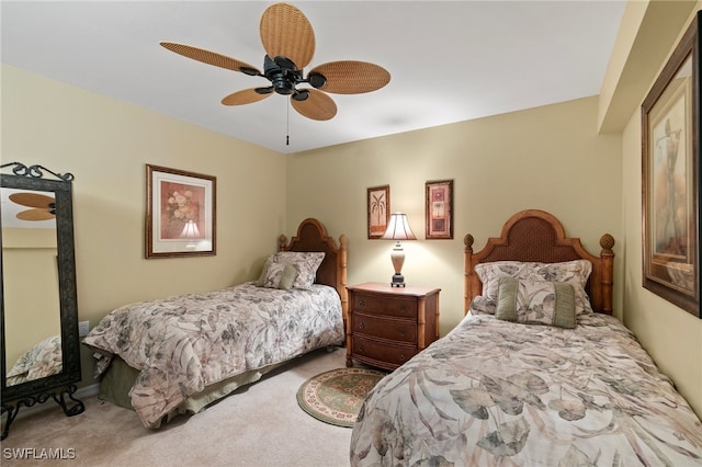 bedroom with ceiling fan and carpet flooring