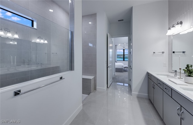 bathroom with tile patterned flooring and vanity