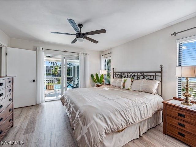 bedroom with ceiling fan, access to exterior, light wood-type flooring, and multiple windows