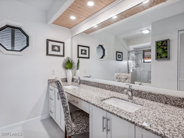 bathroom featuring vanity, an enclosed shower, and wooden ceiling