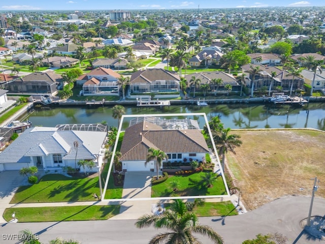 drone / aerial view with a water view