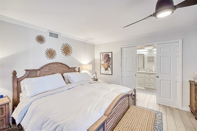 bedroom with ensuite bathroom, crown molding, ceiling fan, and light hardwood / wood-style floors