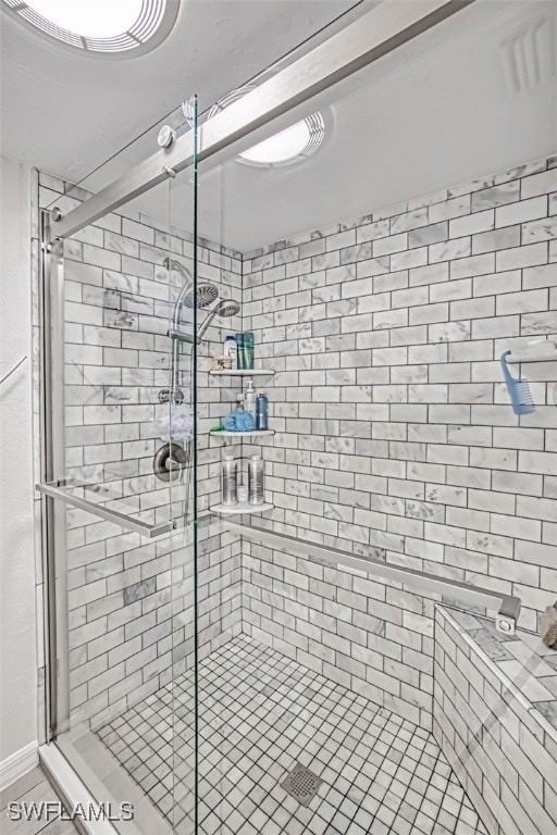 bathroom with walk in shower