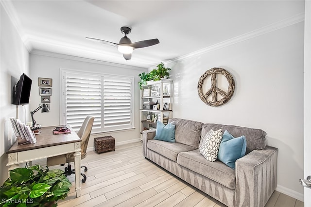 home office featuring ceiling fan, light hardwood / wood-style flooring, and crown molding