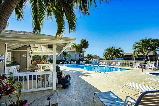 view of pool featuring a patio