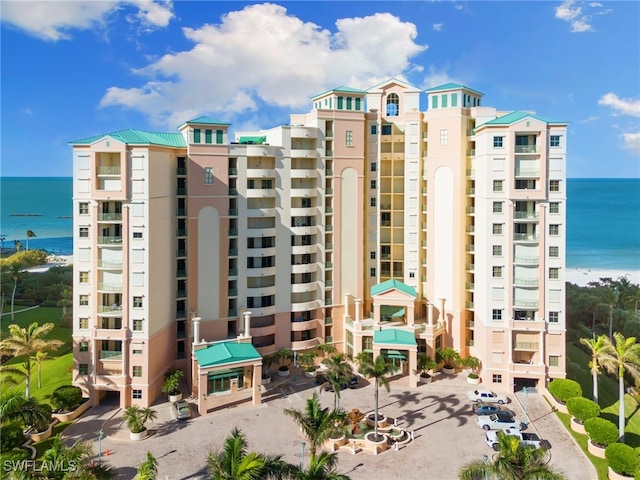 view of property with a water view