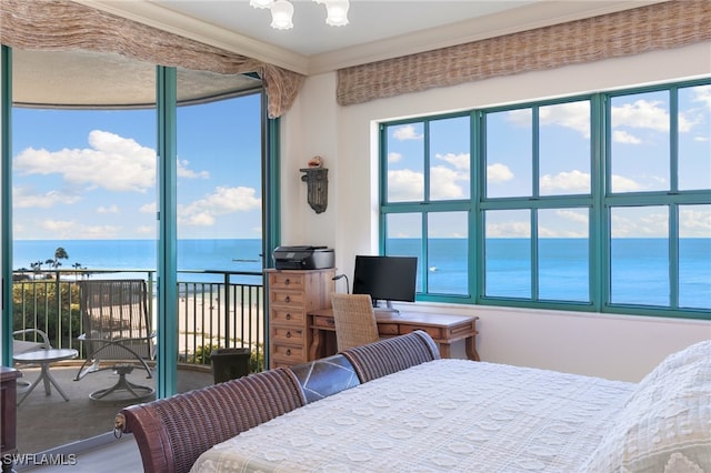 bedroom with carpet floors, crown molding, access to outside, and a chandelier