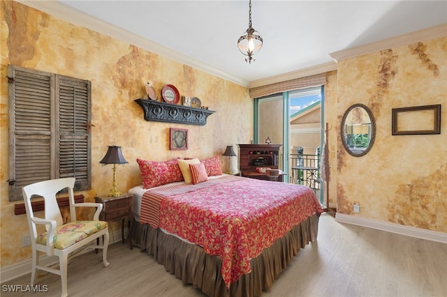 bedroom featuring light hardwood / wood-style floors and crown molding