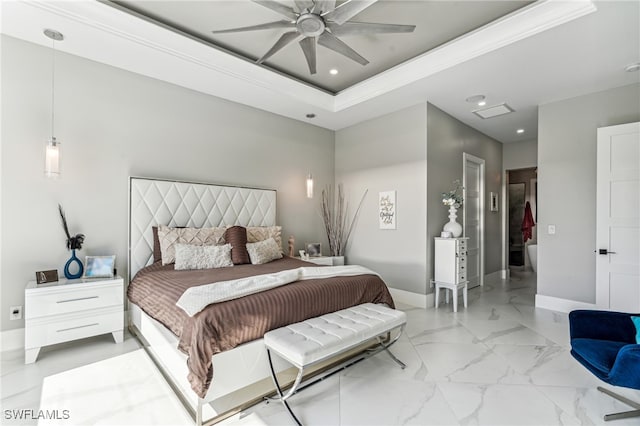 bedroom featuring ceiling fan, a raised ceiling, and a closet