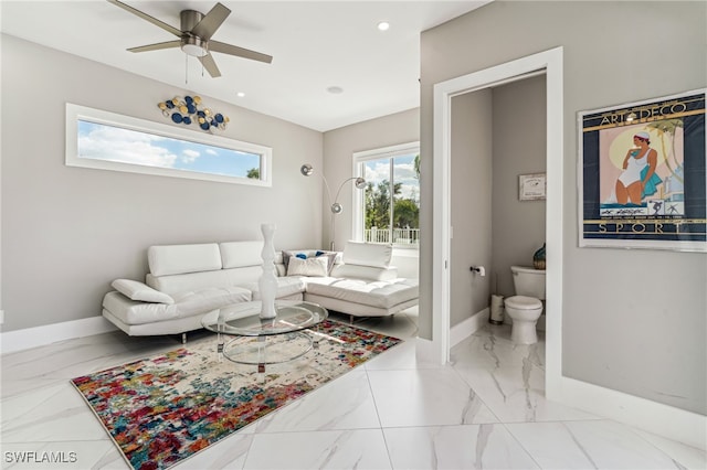 living room with ceiling fan