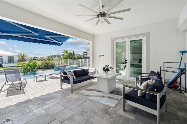 view of patio with french doors, an outdoor hangout area, and ceiling fan