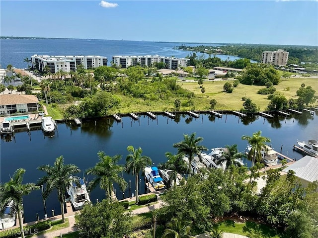 birds eye view of property featuring a water view