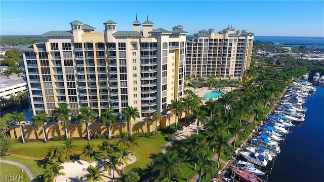 view of building exterior with a water view