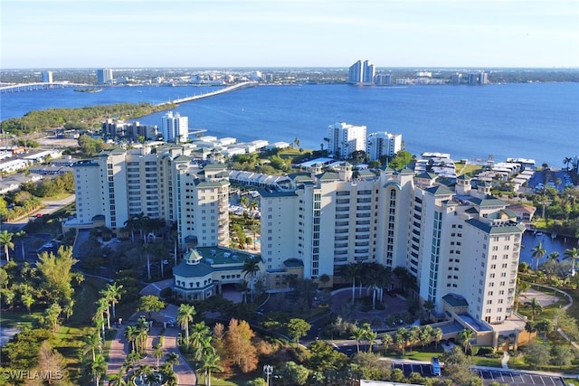 bird's eye view featuring a view of city and a water view