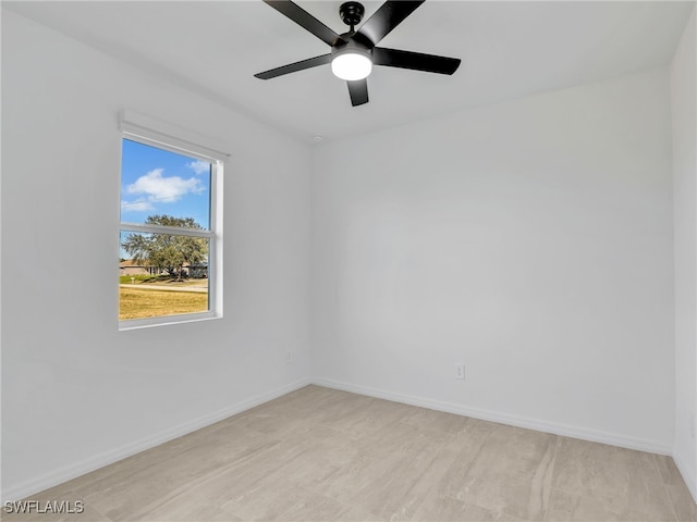 empty room featuring ceiling fan