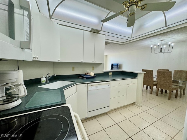 kitchen featuring white cabinetry, dishwasher, sink, light tile patterned flooring, and ceiling fan with notable chandelier