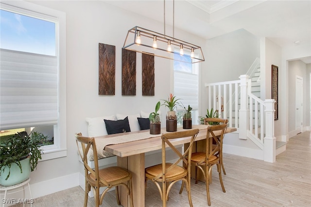 dining room featuring light hardwood / wood-style floors and an inviting chandelier