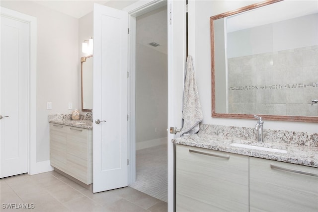 bathroom featuring vanity and tile patterned floors