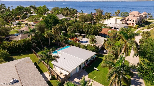 birds eye view of property featuring a water view