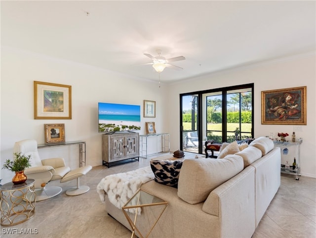 living room featuring light tile patterned floors, ceiling fan, and crown molding