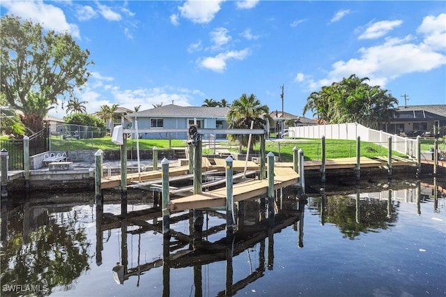 dock area with a water view