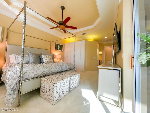 carpeted bedroom featuring ceiling fan and ornamental molding