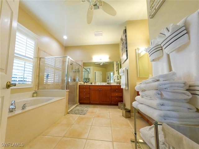 bathroom featuring tile patterned floors, plus walk in shower, vanity, and ceiling fan