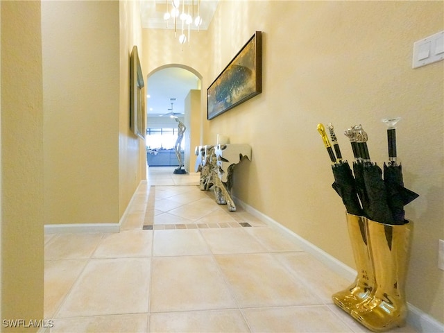 hall featuring tile patterned flooring