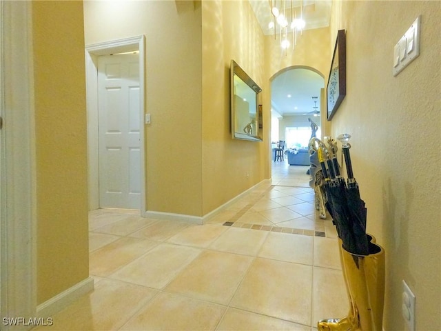 hallway with tile patterned flooring