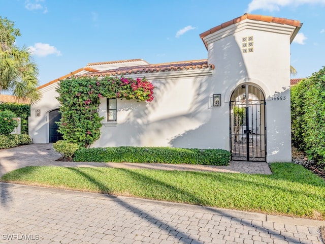 view of front of property with a garage