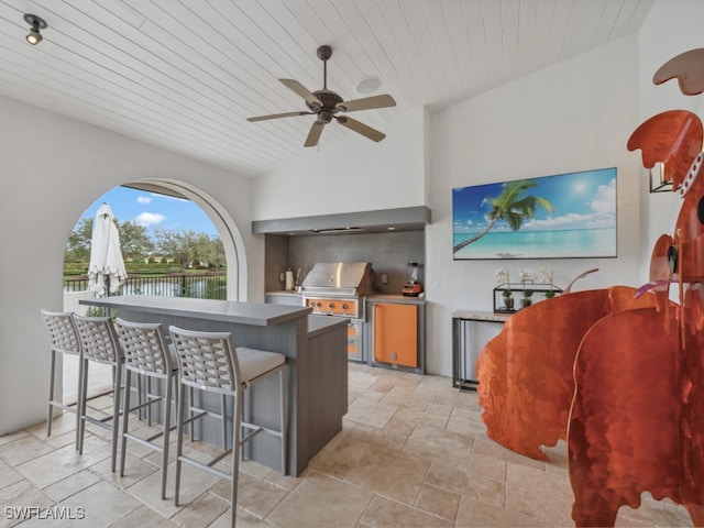 kitchen with ceiling fan and wooden ceiling