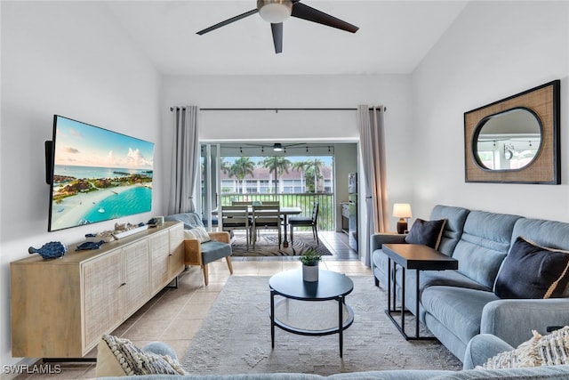 tiled living room with ceiling fan