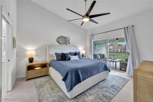 carpeted bedroom featuring ceiling fan, access to exterior, and high vaulted ceiling