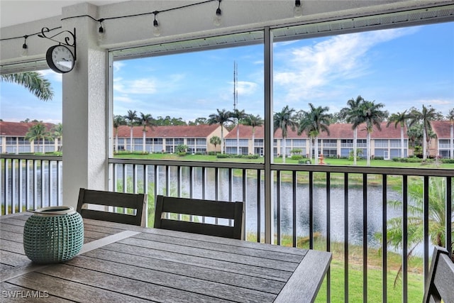 deck featuring a water view