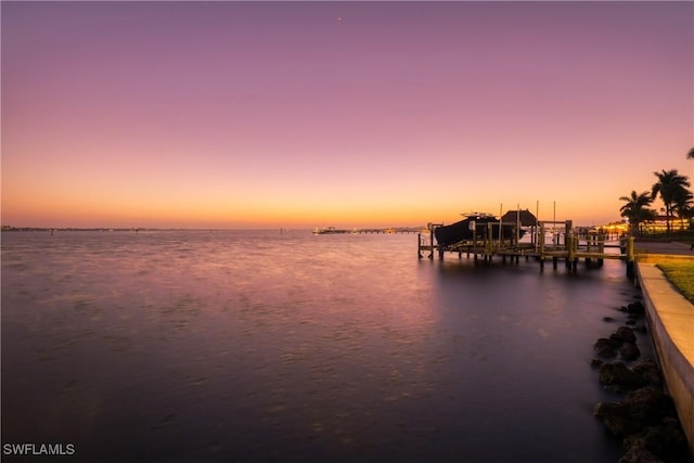 water view featuring a dock