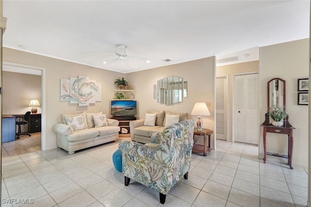 1204 SE 6th Ter Unit 67, Cape Coral, FL 33990 - living area featuring light tile patterned floors, ceiling fan, recessed lighting, crown molding, and baseboards