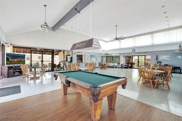 rec room featuring hardwood / wood-style floors, a towering ceiling, ceiling fan, and pool table