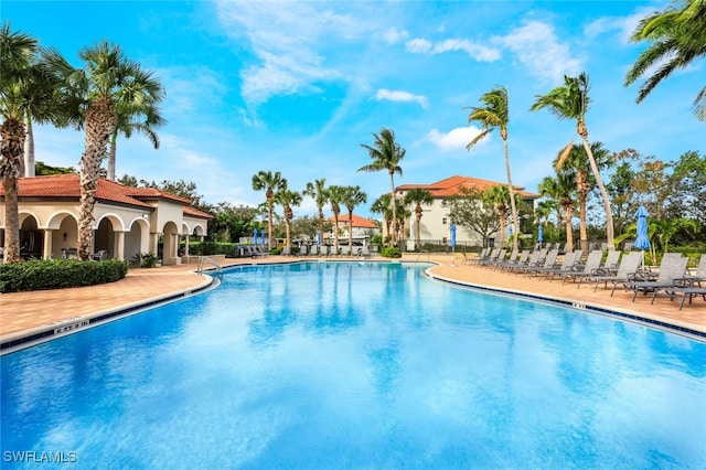 pool with a patio area